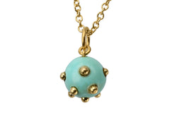 thumbnail of Vintage turquoise pendant studded with gold beads, hanging on chain against white background.