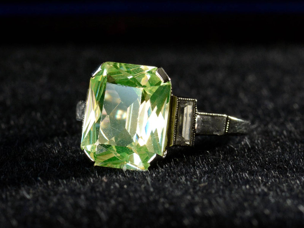 Right angle view of c1930 Uranium Glass White Gold Ring (on black background)