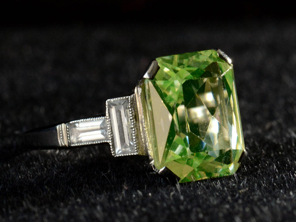 Left angle view of c1930 Uranium Glass White Gold Ring (on black background)