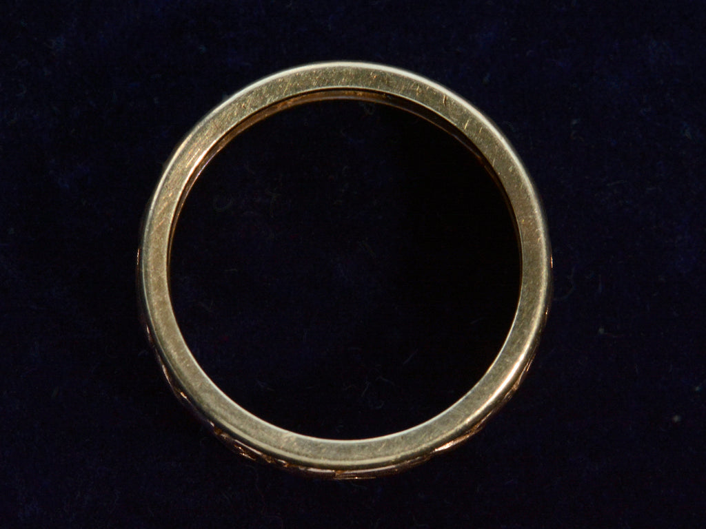 Side profile view of c1890 Two-Toned Rose and Green Gold Band (on dark blue background)