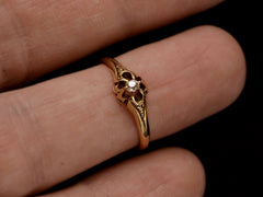 thumbnail of c1880 Victorian belcher setting engagement ring with a small old mine cut diamond set in yellow gold, shown on finger.
