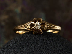 thumbnail of c1880 Victorian belcher setting engagement ring with a small old mine cut diamond set in yellow gold, shown on dark background.