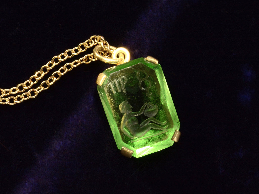 Front detail view of c1890 Virgo Green Intaglio Pendant (on dark purple background)