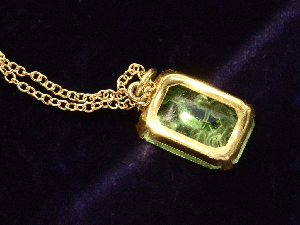 Reverse side detail view of c1890 Virgo Green Intaglio Pendant (on dark purple background)