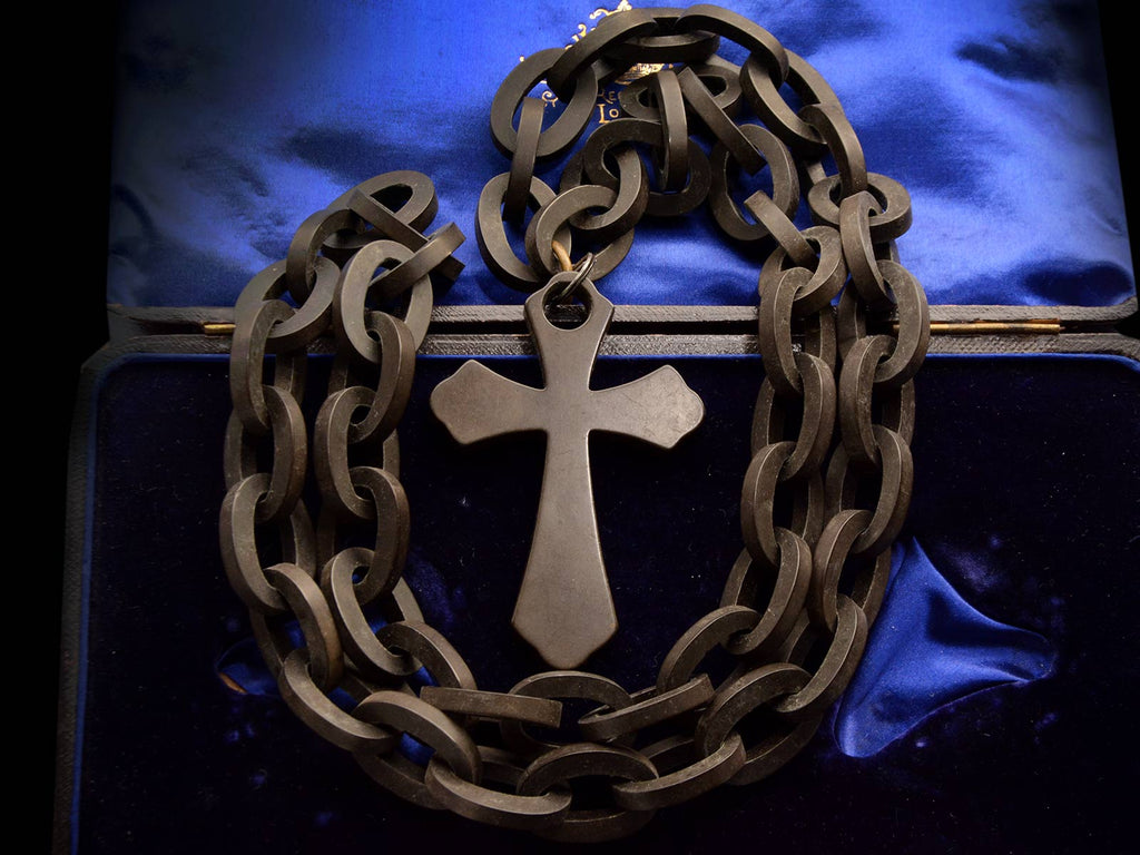 c1880 Black Vulcanite Cross & Chain (on dark blue background)