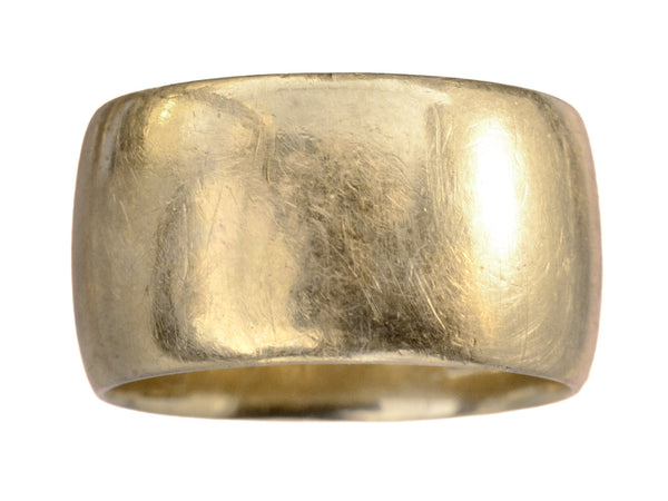 A wide patinated antique rosy-yellow gold wedding band, on white background.
