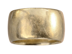 thumbnail of A wide patinated antique rosy-yellow gold wedding band, on white background.
