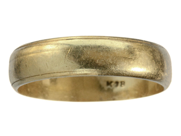c1920 Wide 18K yellow gold wedding band with edge detailing and a mark inside reading "K18." On white background.