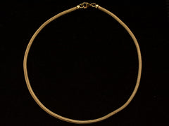 thumbnail of c1980 Woven 18K Yellow Gold Necklace Chain, shown laid out as it would hang on the neck on black background