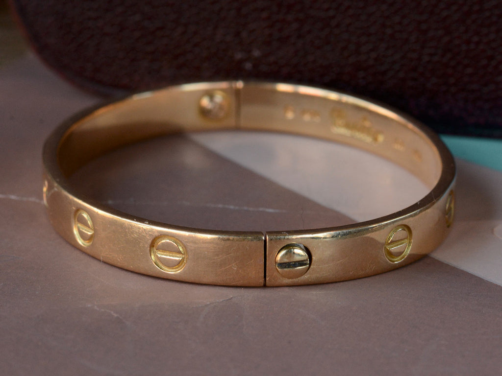 Sold at Auction: CARTIER 18K YELLOW GOLD LOVE BRACELET SIZE 16
