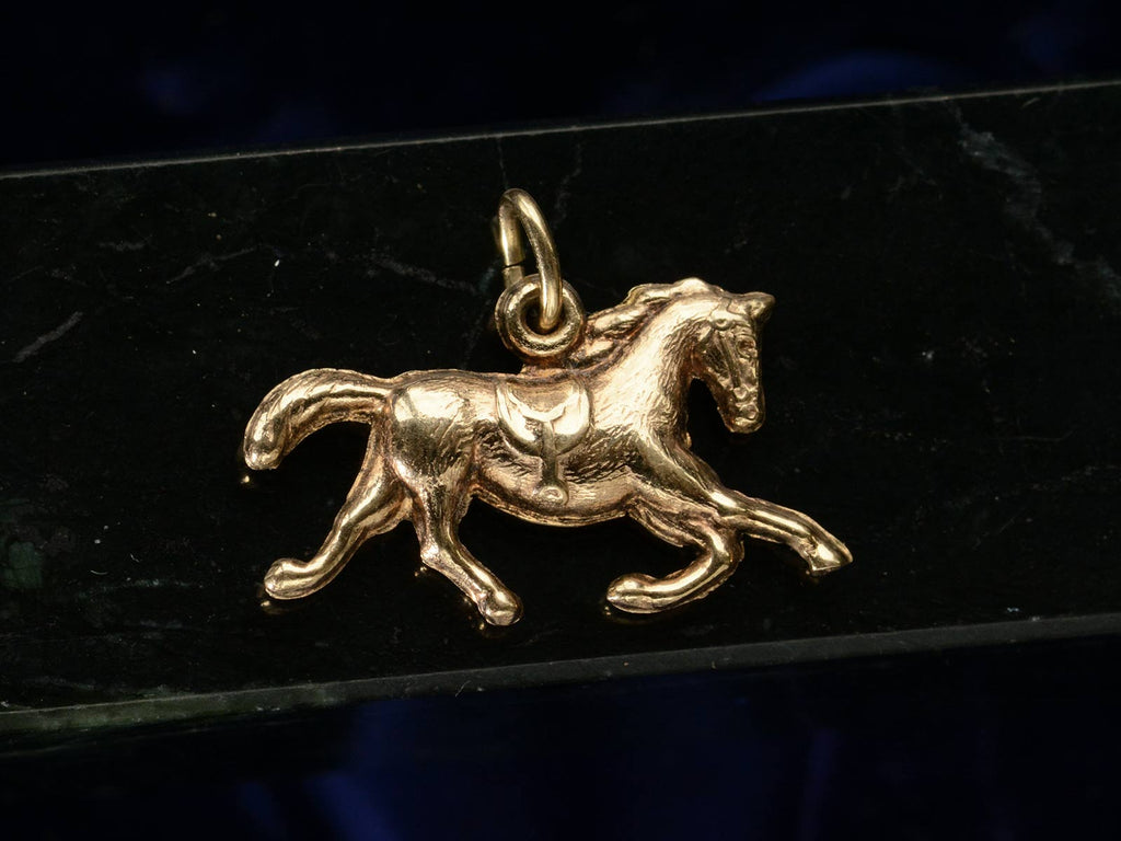 c1940 Gold Horse Charm (on black background)